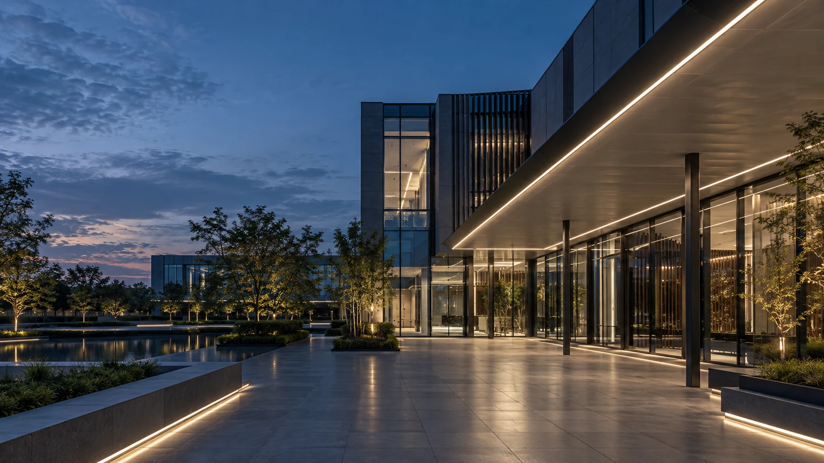 Glass pavilion at blue hour with integrated LED lighting